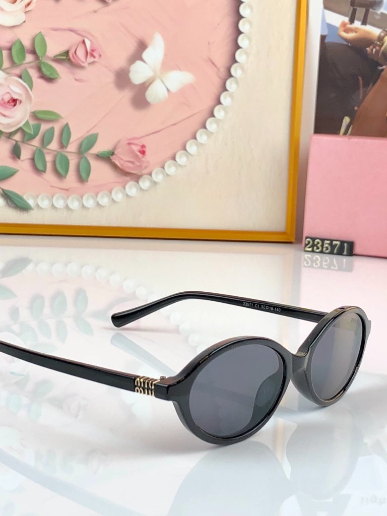 Miu Miu Retro Oval Sunglasses 129$